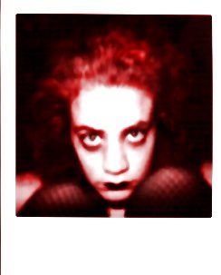 me as a redheaded goth...thanks to the magic of chemistry